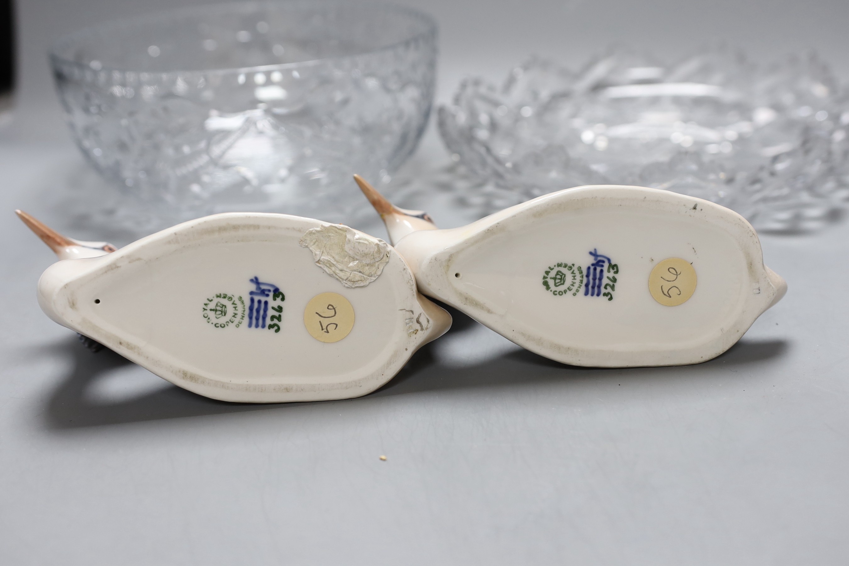 A pair of Royal Copenhagen great crested grebes and two cut glass bowls